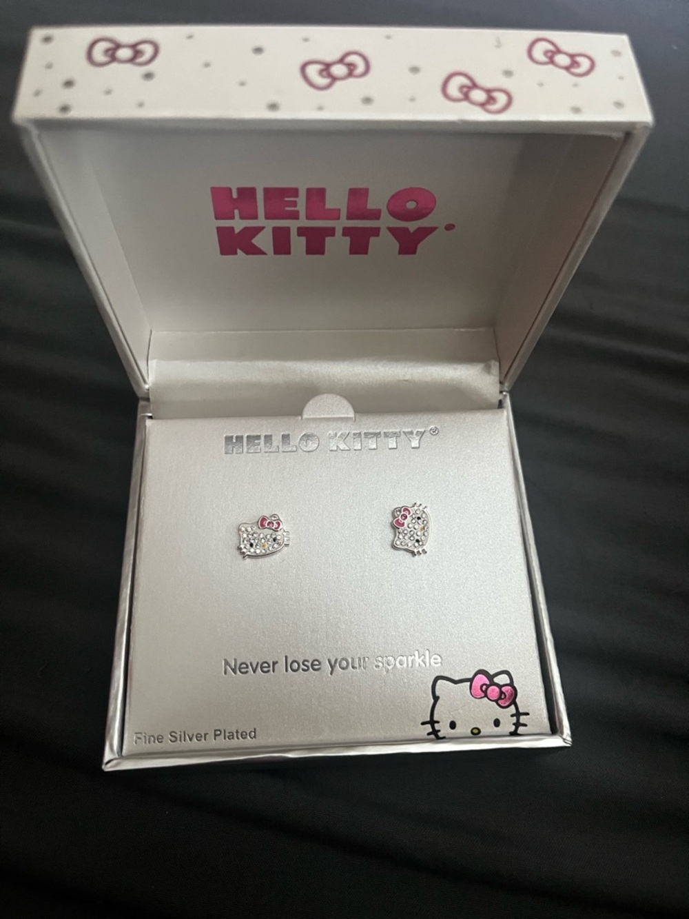 New in box hello kitty rhinestone earring studs retail $50